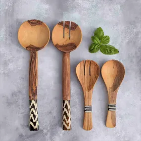 Two sets of wooden salad servers